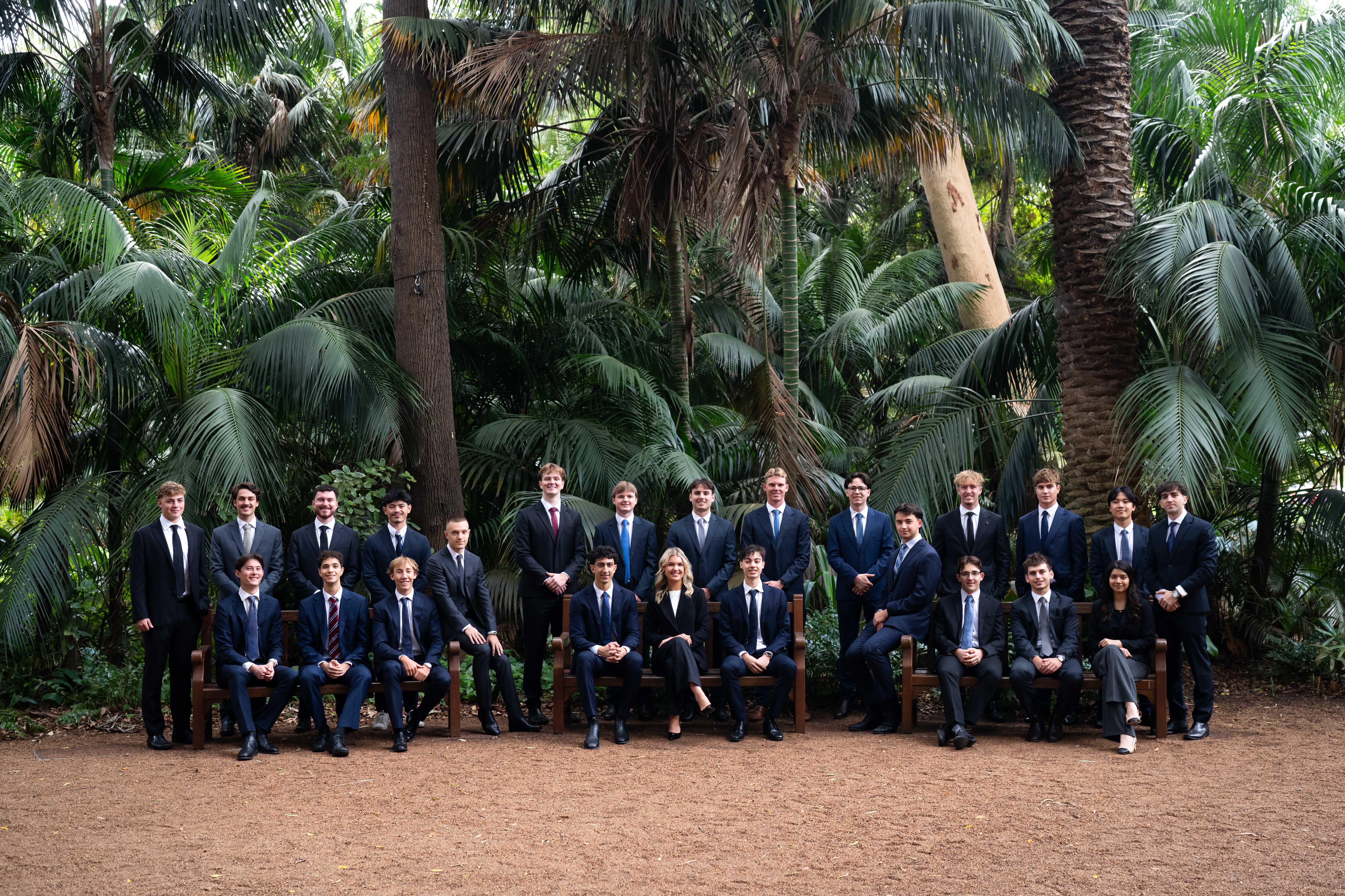 The full UWA Student Managed Investment Fund club seated in the garden